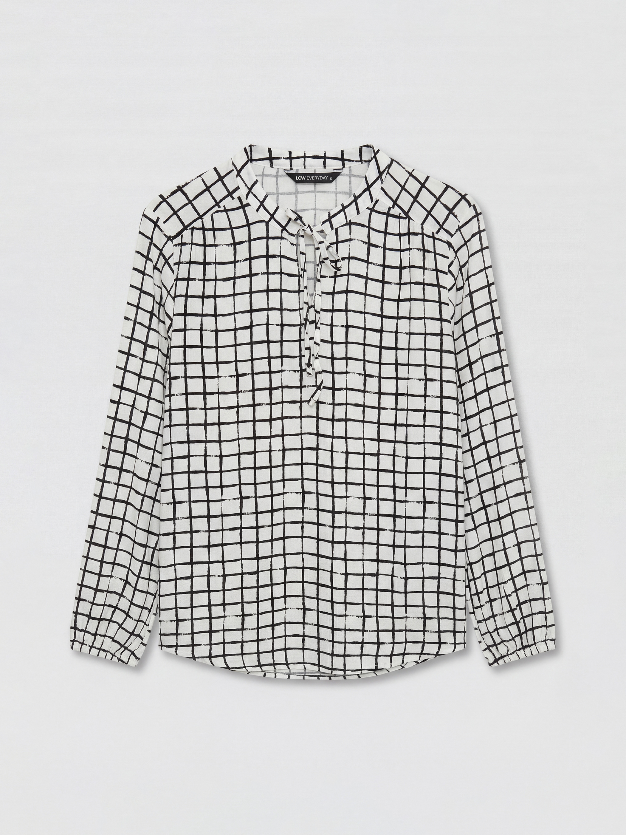 بلوزة منقوشة بياقة مربوطة-4