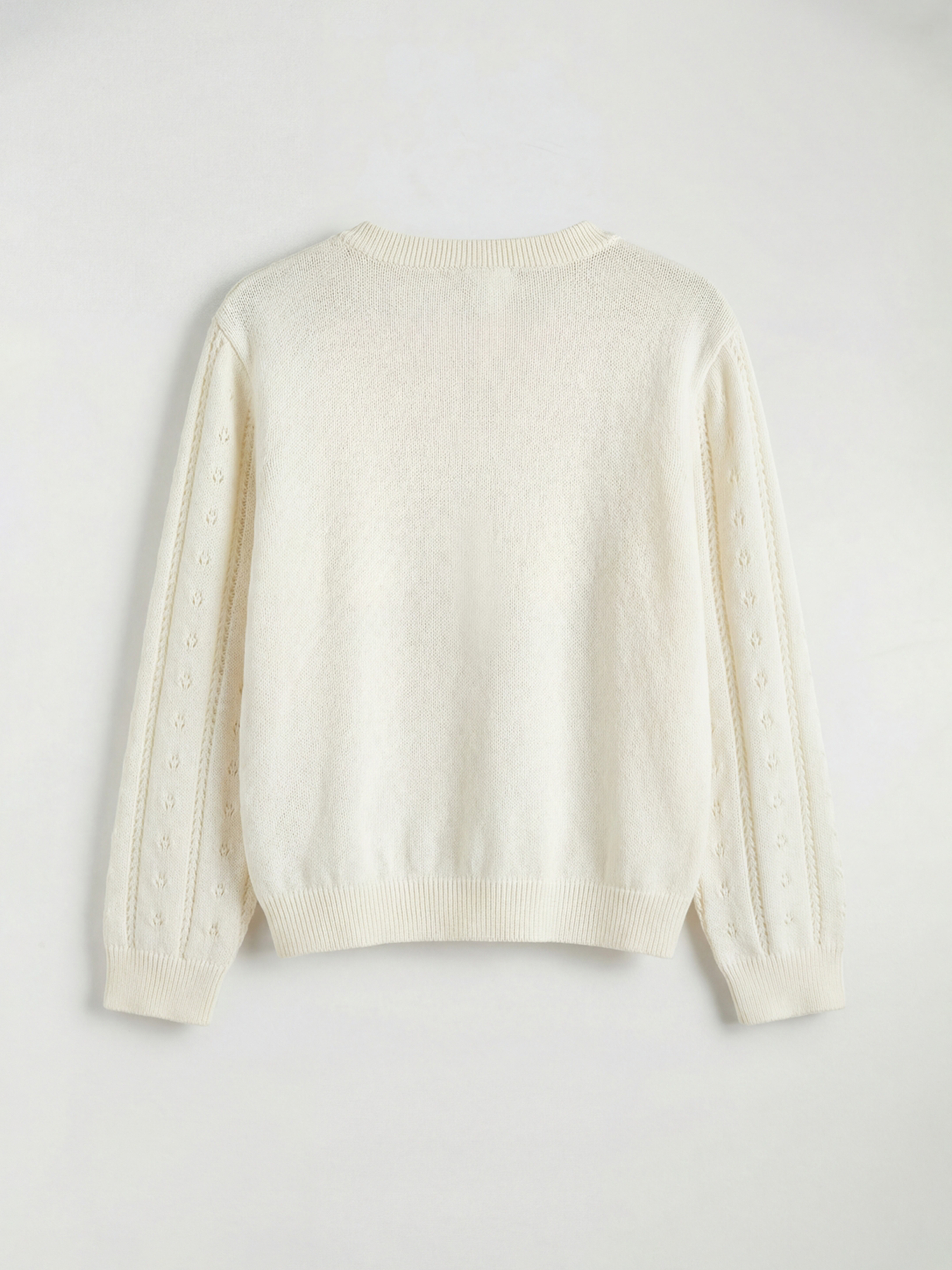 Girls' floral knit cardigan with a round neck.-1