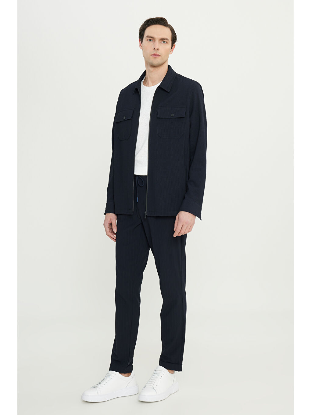 Erkek Lacivert Slim Fit Dar Kesim Beli Bağlamalı Yan Cepli Gofre Desenli Casual Pantolon-1