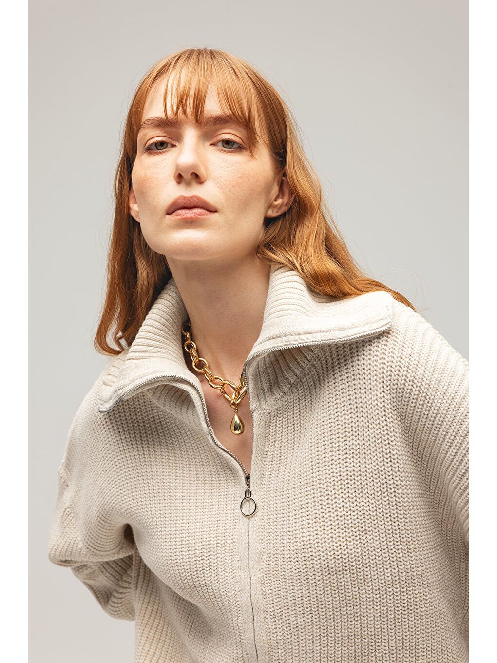 Bej Taş Kadın Oversize Uzun Kollu Fermuarlı Yarım Balıkçı Yaka Triko Hırka-1