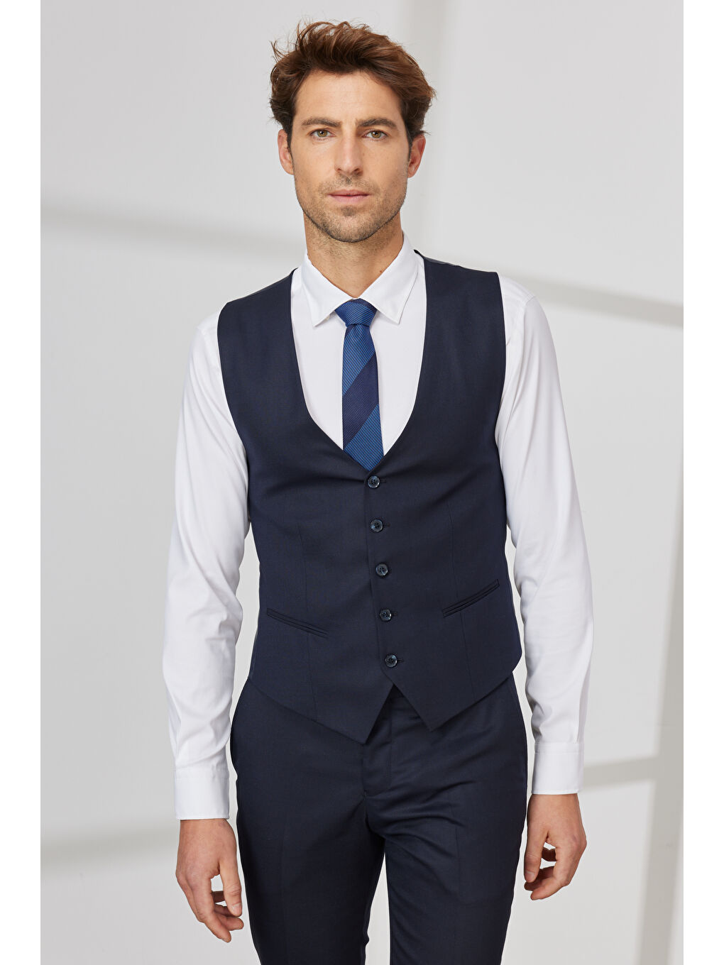 Erkek Lacivert Ekstra Slim Fit Dar Kesim Yünlü Armürlü Yelekli Takım Elbise-1