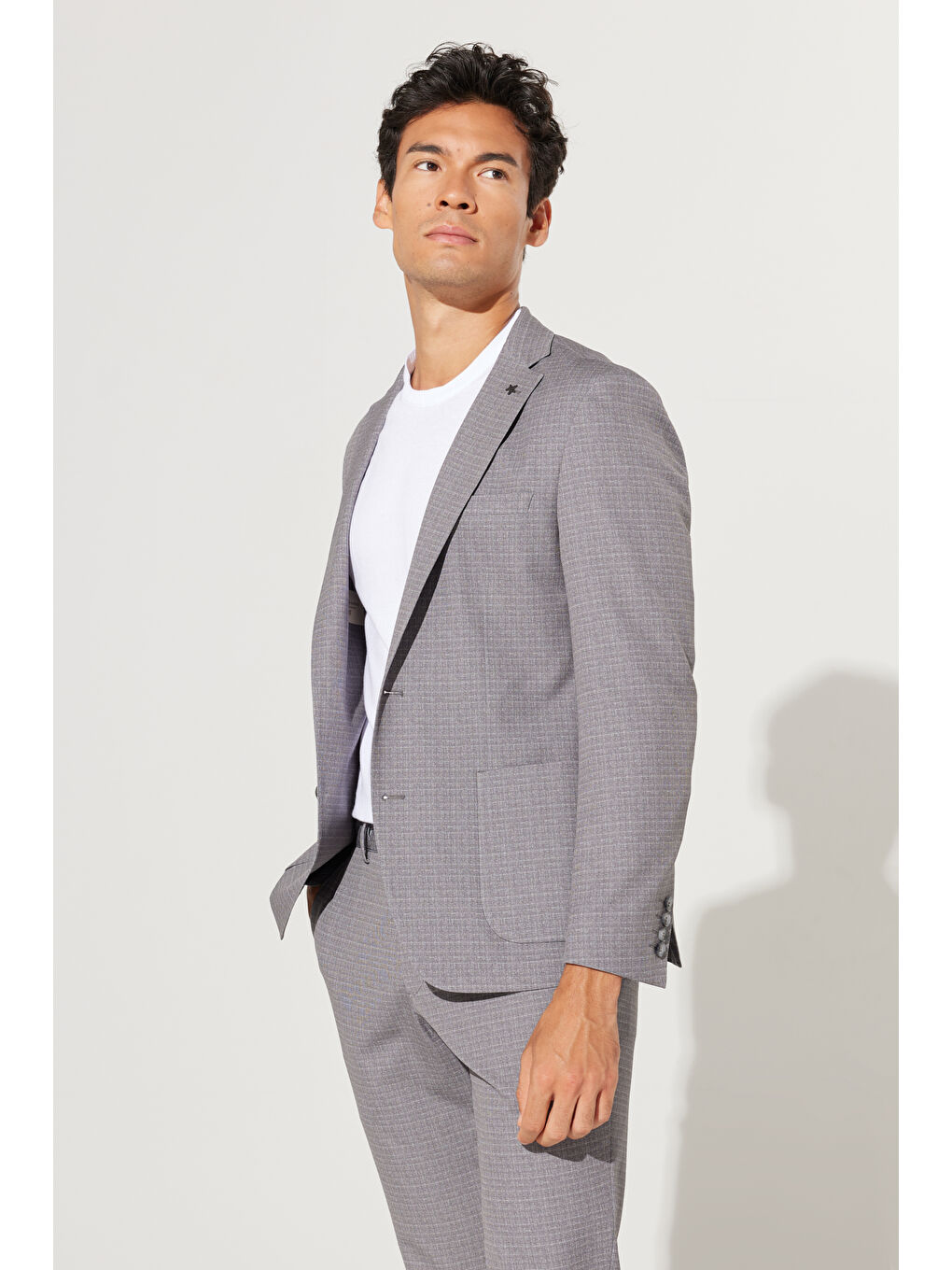 Erkek Bej Slim Fit Dar Kesim Mono Yaka Seyahat Çantalı Desenli Takım Elbise