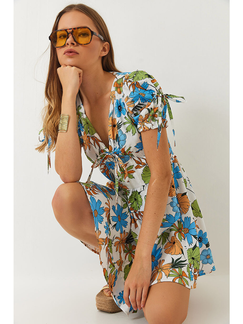 Mavi Kadın Emprime Vatkalı Çiçek Desenli Fiyonk Detaylı Mini Elbise