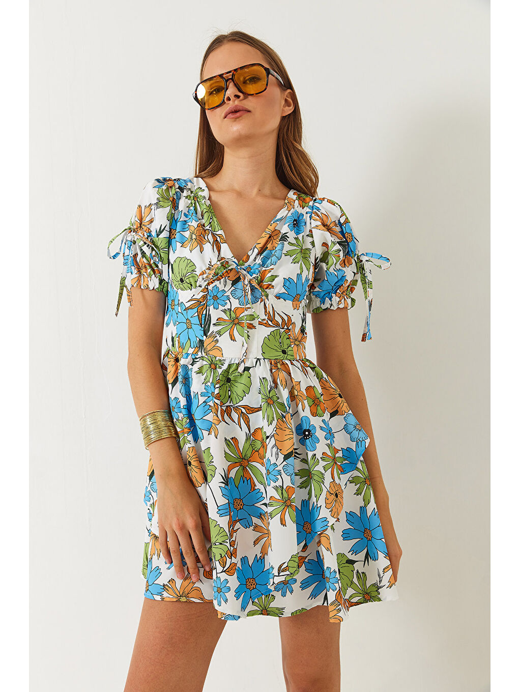 Mavi Kadın Emprime Vatkalı Çiçek Desenli Fiyonk Detaylı Mini Elbise-3