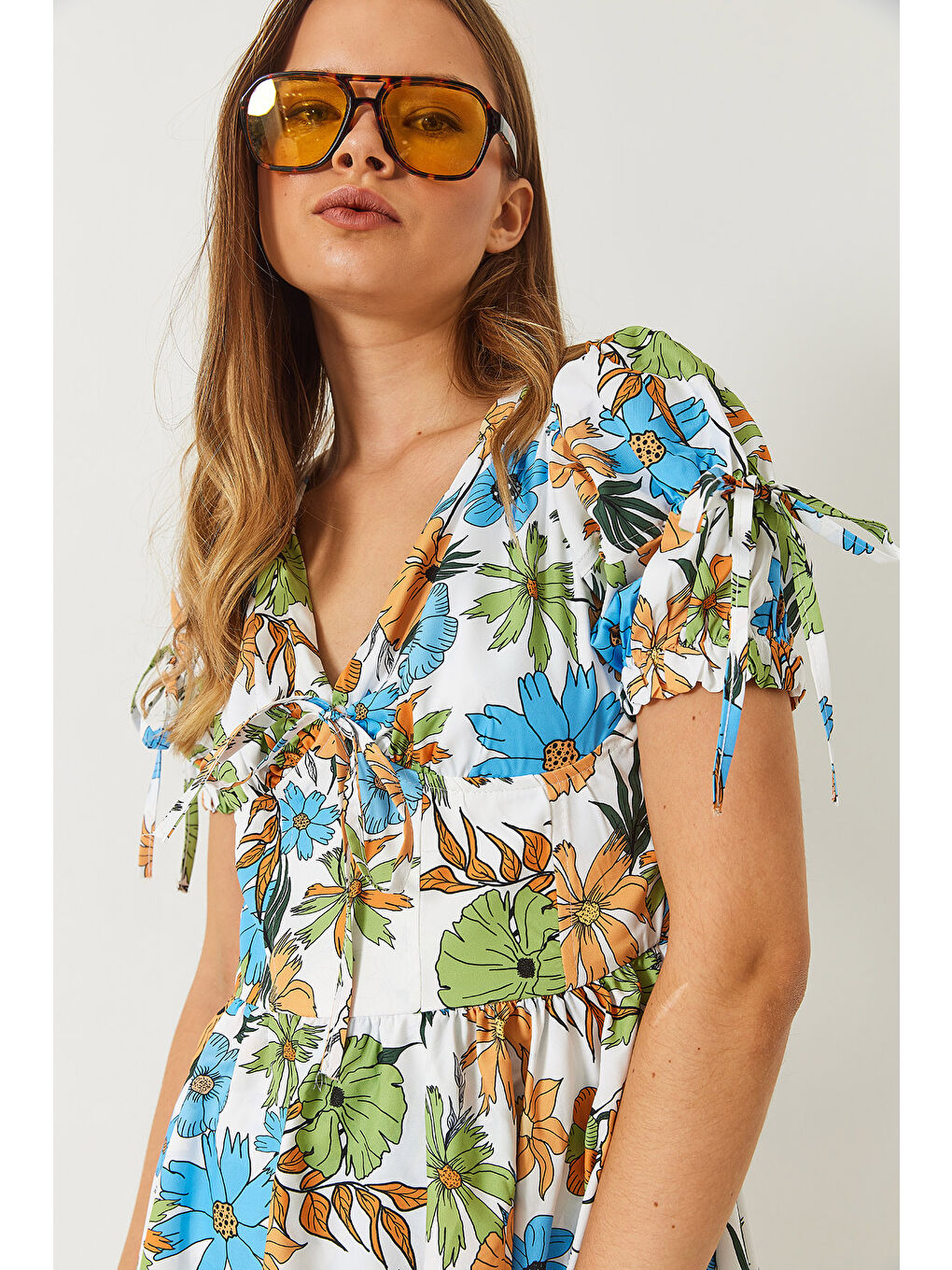 Mavi Kadın Emprime Vatkalı Çiçek Desenli Fiyonk Detaylı Mini Elbise-6