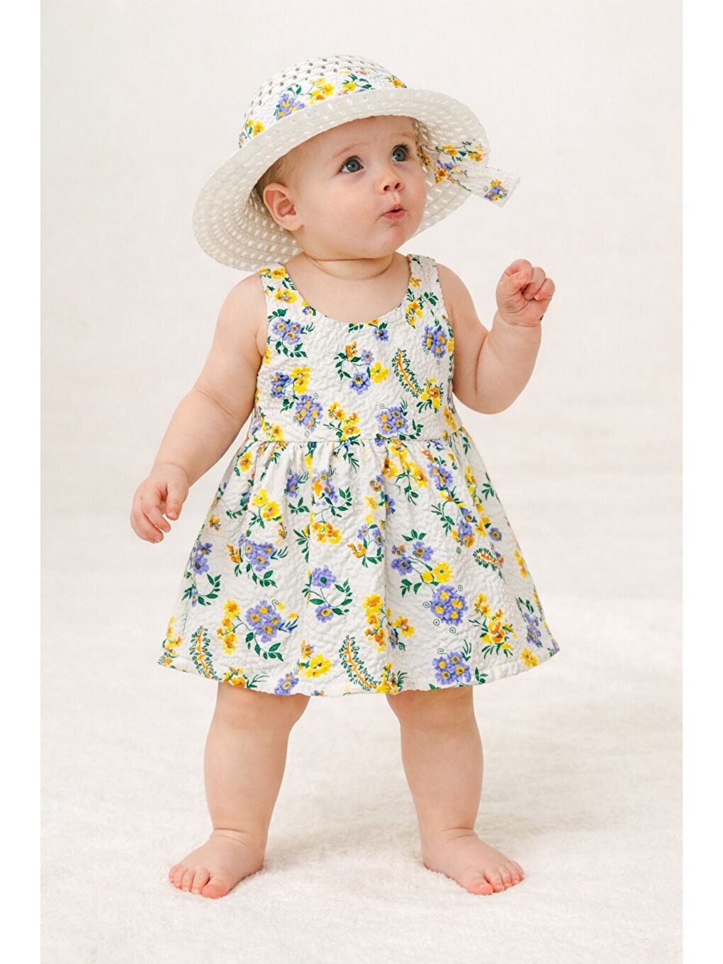 Mavi Çiçek Desenli Şapkalı Fiyonklu Kız Bebek Elbisesi