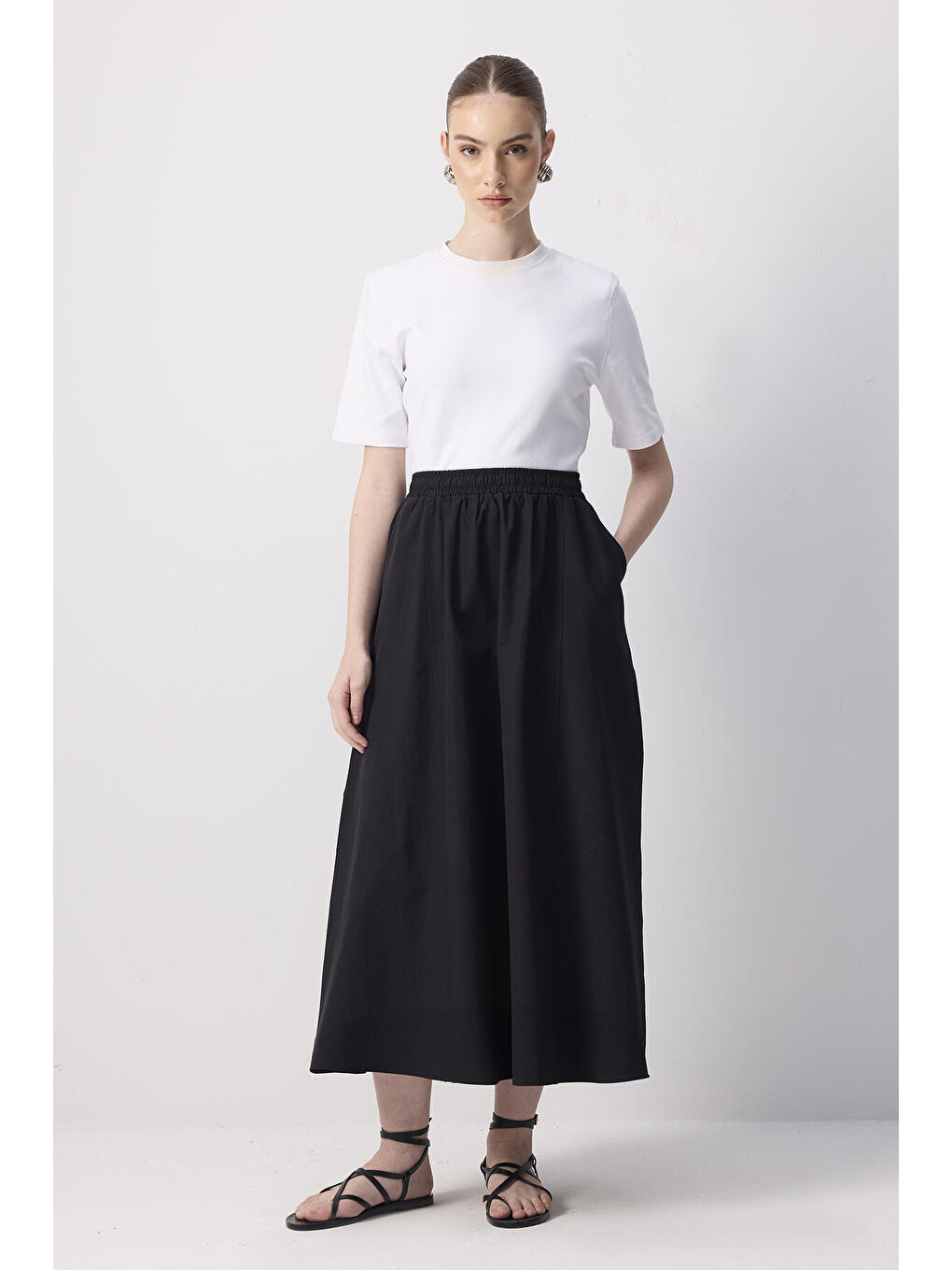 Siyah Beli Büzgülü Dokuma Etek