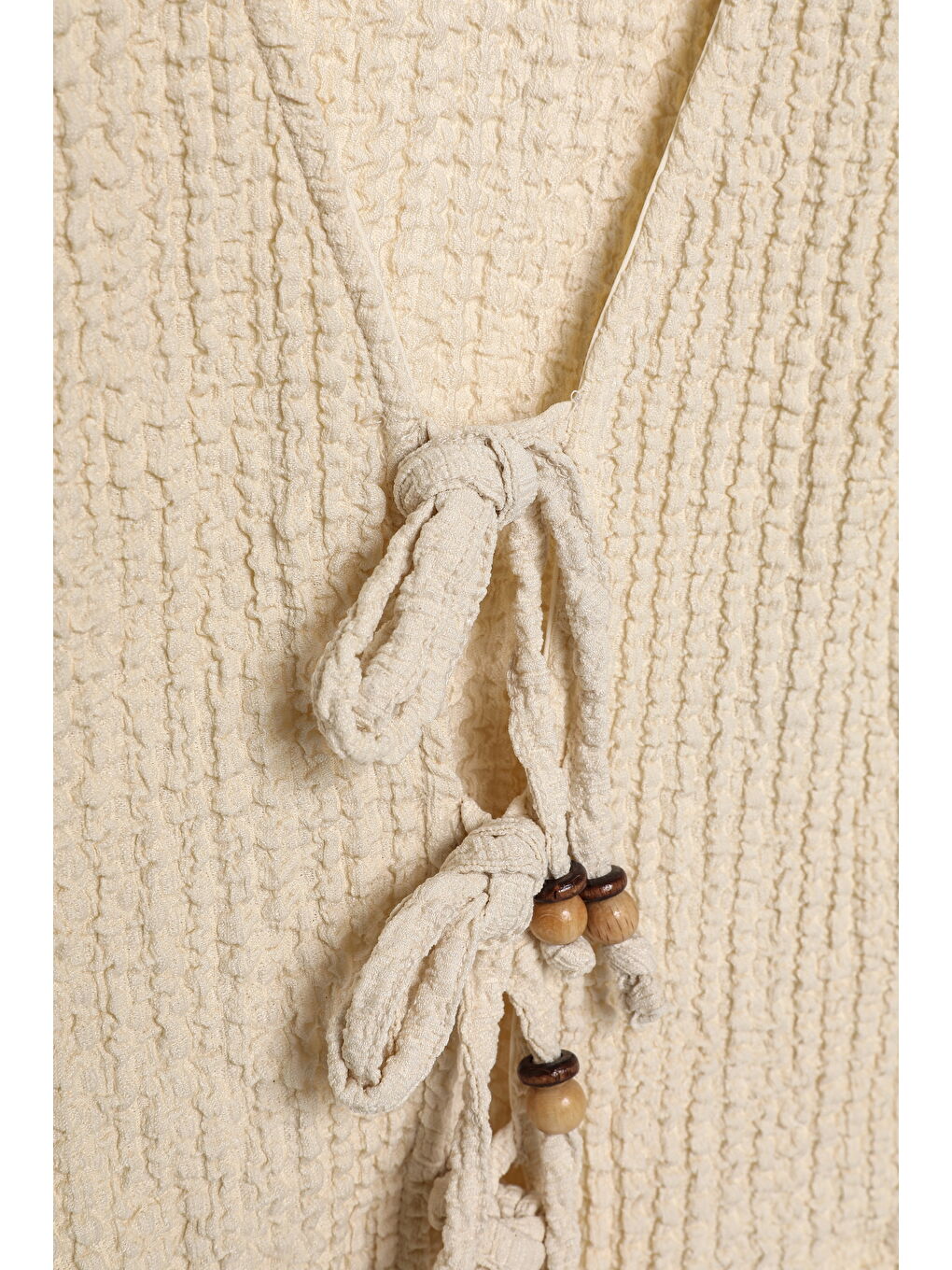 Bej Boncuk Bağlamalı Gofre Bluz Taş-1