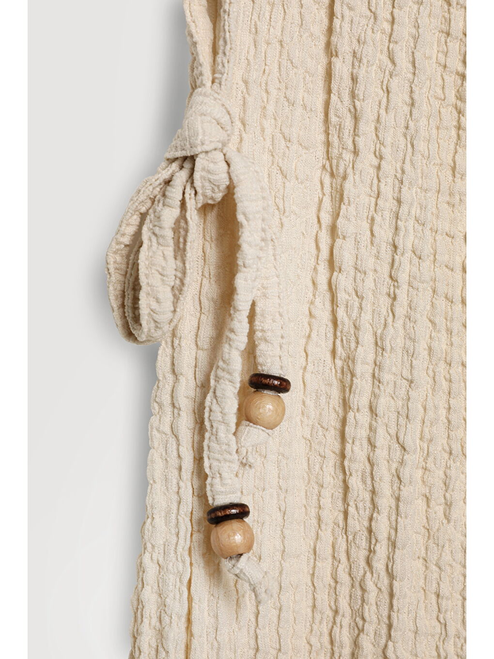 Bej Yanları Boncuk Bağlamalı Gofre Pantolon Taş-1