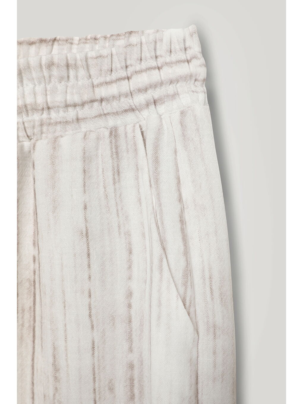 Bej Boncuk İp Bağlamalı Dokulu Pantolon Taş-1