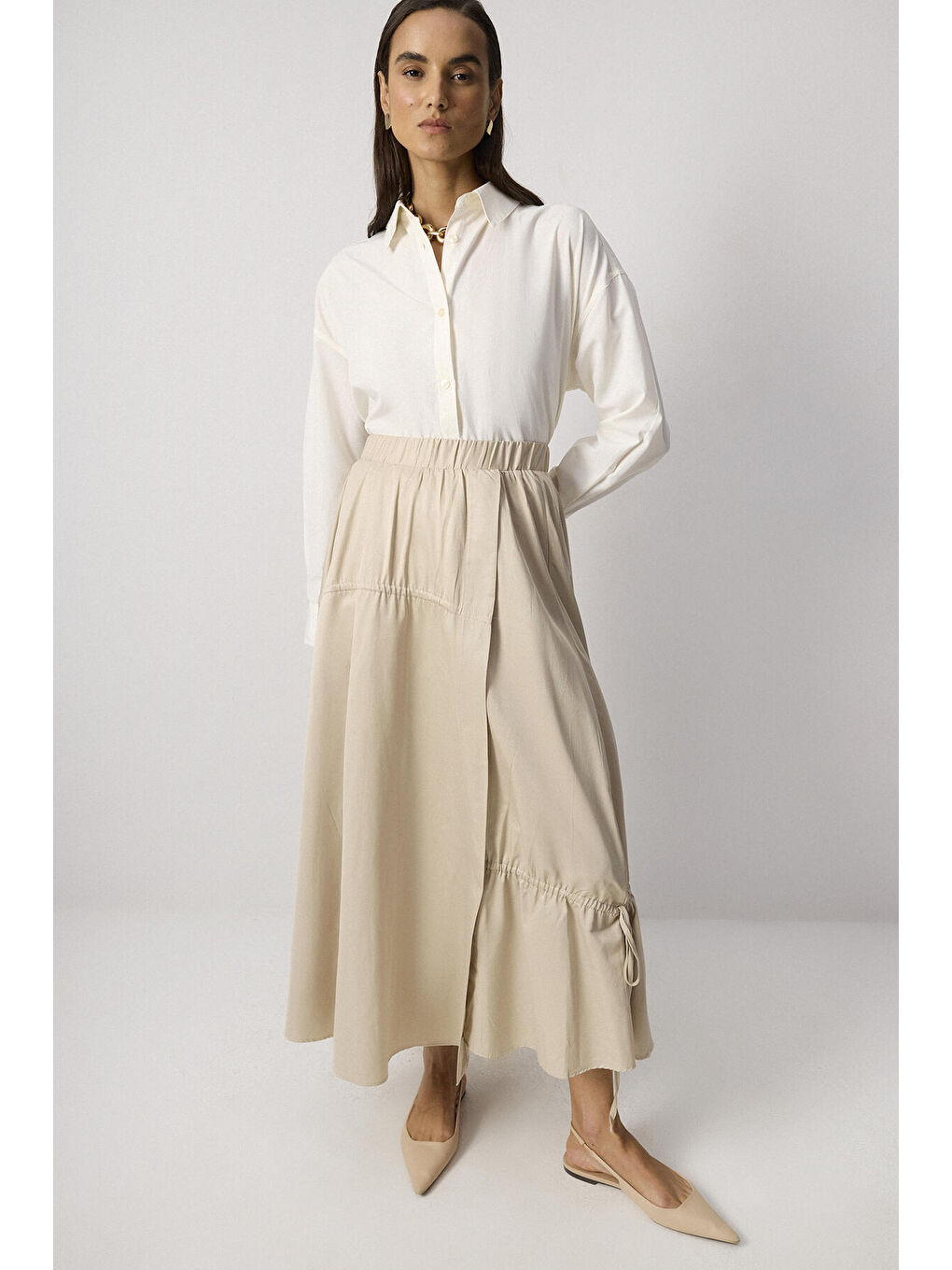 Bej Büzgü Detaylı Etek