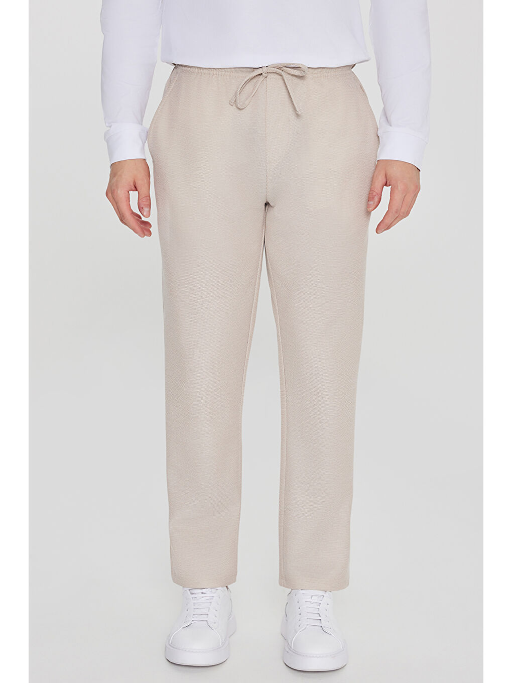 Erkek Bej Pamuklu Standart Fit Normal Kesim Beli Lastikli Diagonal Desenli Örme Pantolon-1