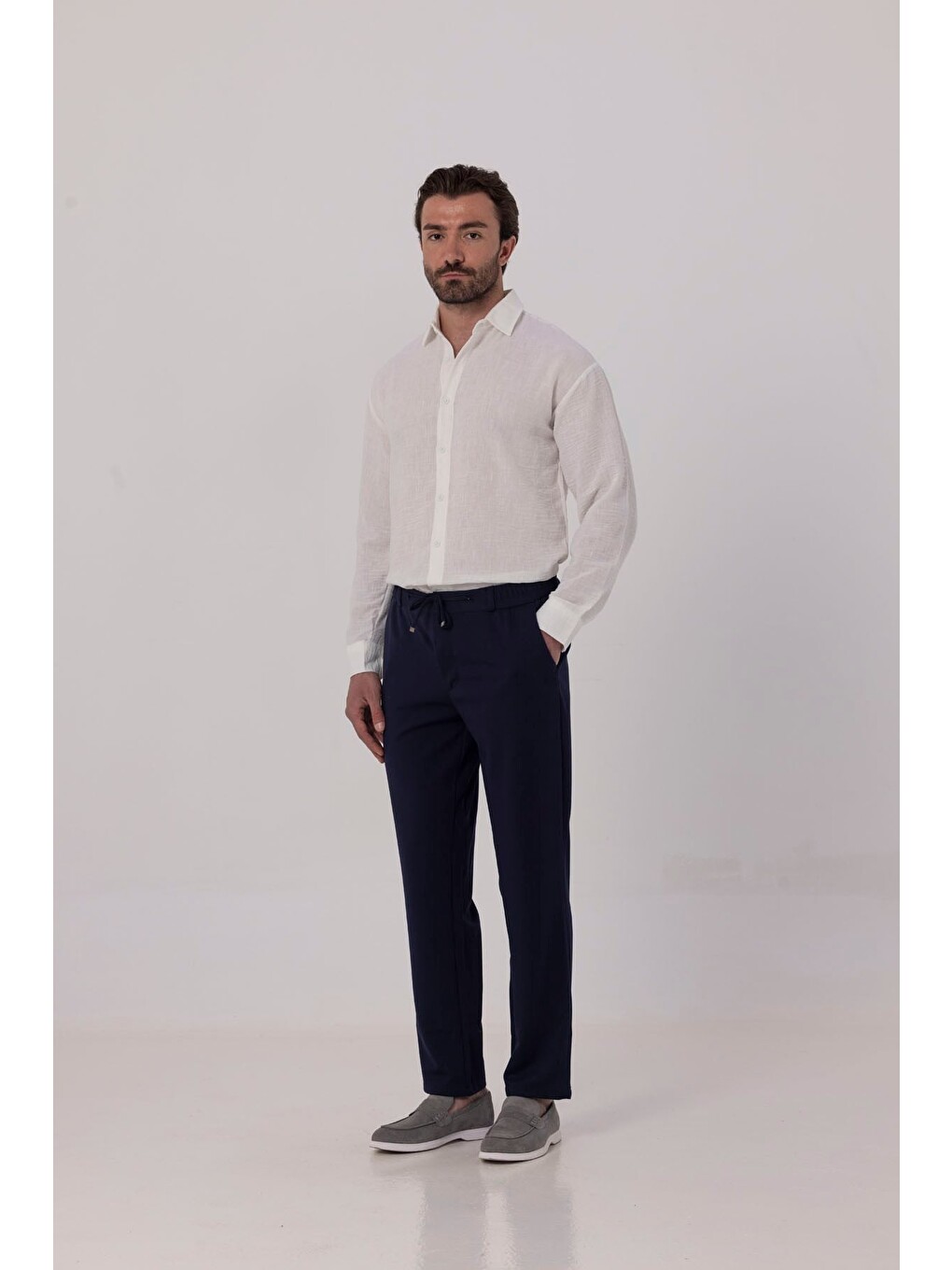 Açık Lacivert Dokulu Arka Lastikli Köprü Kemerli Bağcıklı Slim Fit Jogger Pantolon-1