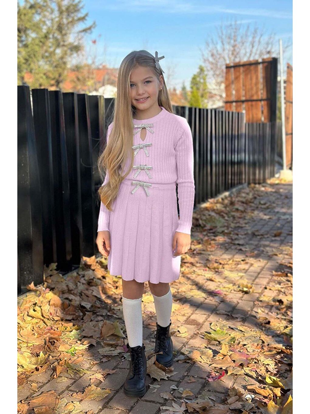 Kız Çocuk Bisiklet Yaka Önden Kurdela Detaylı Kazak Pliseli Triko Pembe Etekli Takım