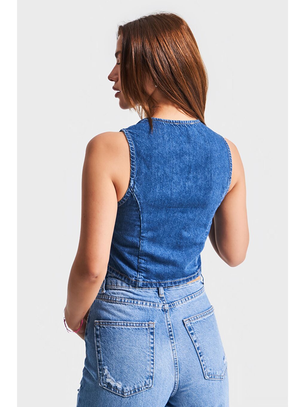 Kadın Mavi Renk 1s5-5 Asimetrik Kesim Önü Düğmeli Sıfır Kol Denim Yelek-2