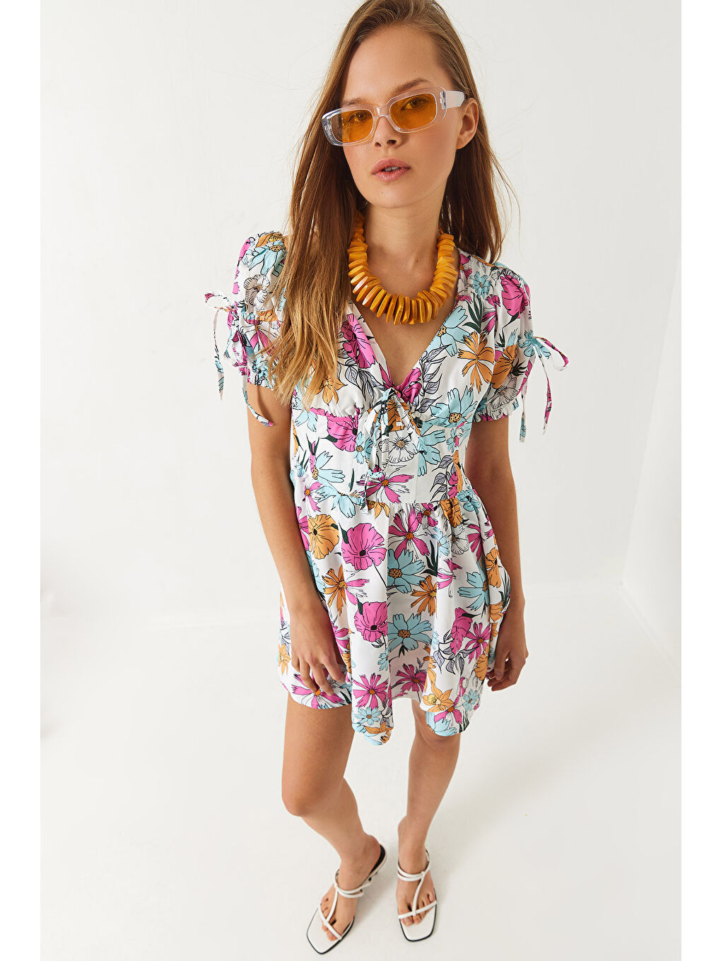 Mavi Kadın Emprime Vatkalı Çiçek Desenli Fiyonk Detaylı Mini Elbise