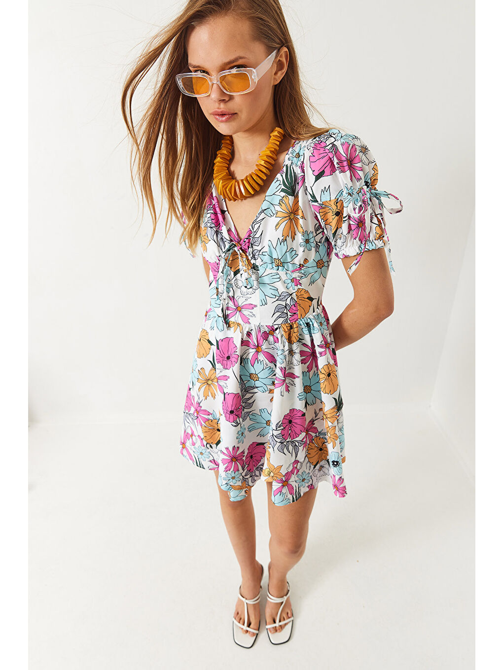 Mavi Kadın Emprime Vatkalı Çiçek Desenli Fiyonk Detaylı Mini Elbise-1