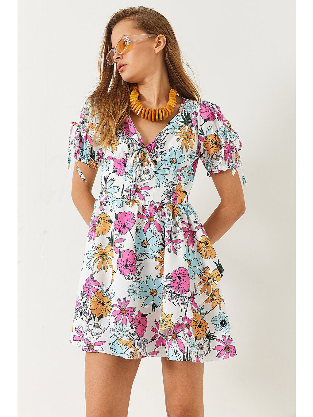 Mavi Kadın Emprime Vatkalı Çiçek Desenli Fiyonk Detaylı Mini Elbise-4