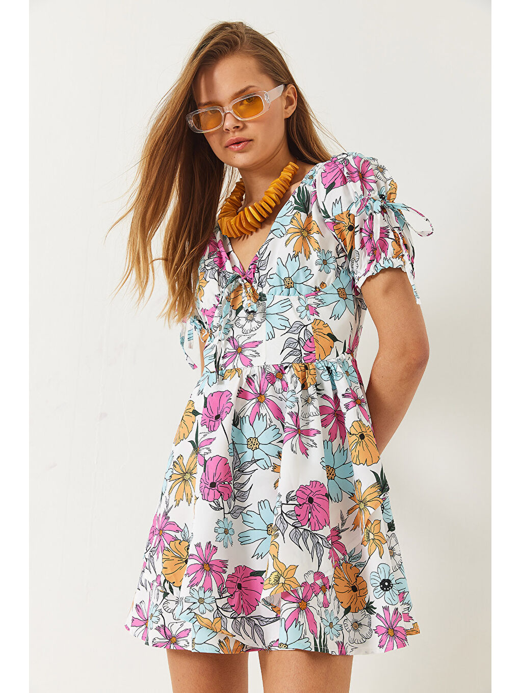 Mavi Kadın Emprime Vatkalı Çiçek Desenli Fiyonk Detaylı Mini Elbise-5