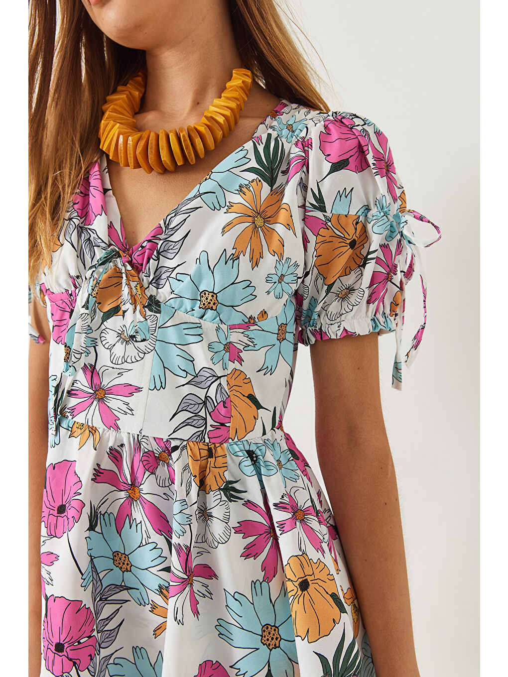 Mavi Kadın Emprime Vatkalı Çiçek Desenli Fiyonk Detaylı Mini Elbise-6