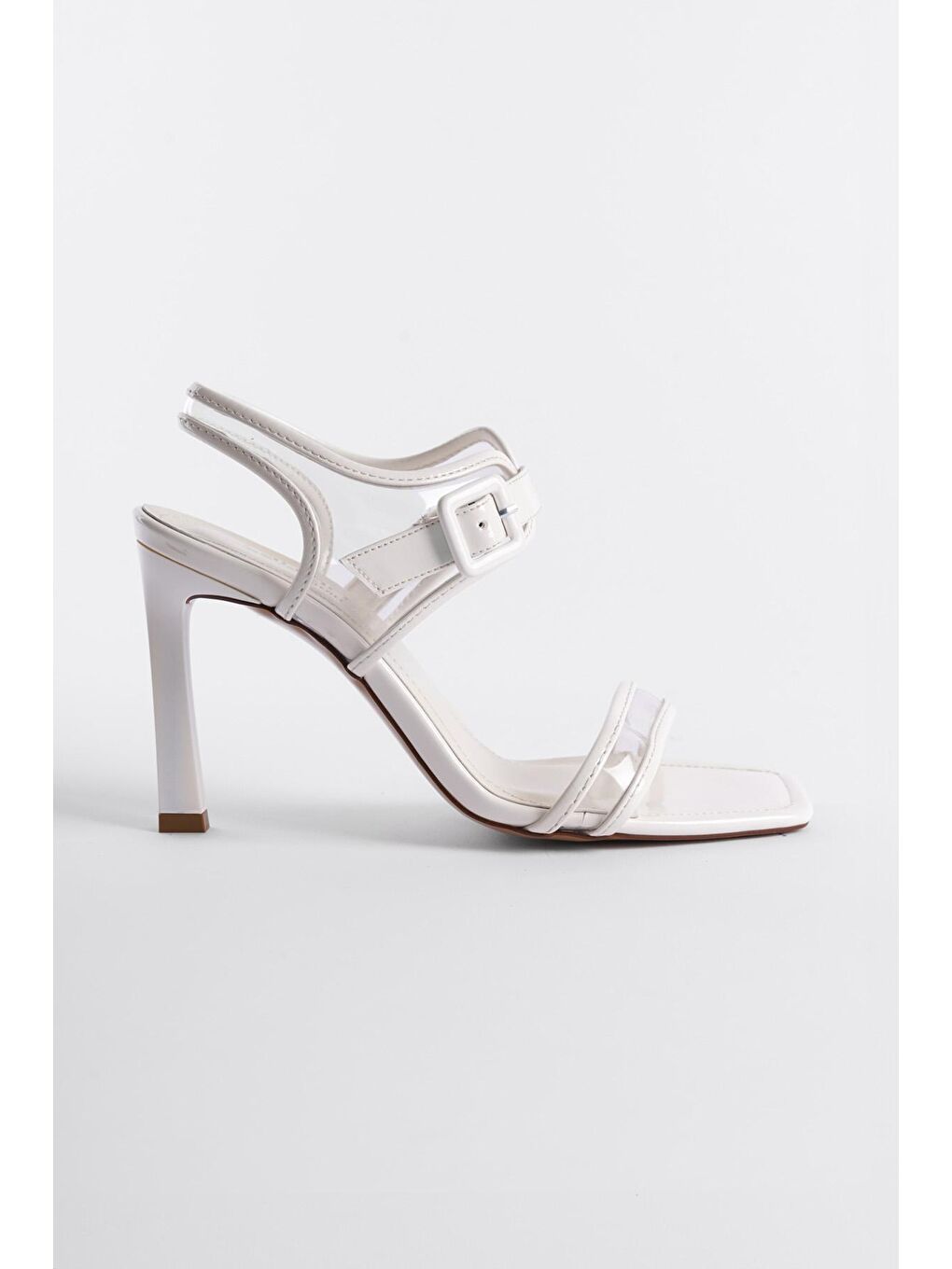 Beyaz Arkası Açık Şeffaf  Bantlı Küt Burunlu  Yüksek Topuklu Rugan Kadın Sandalet