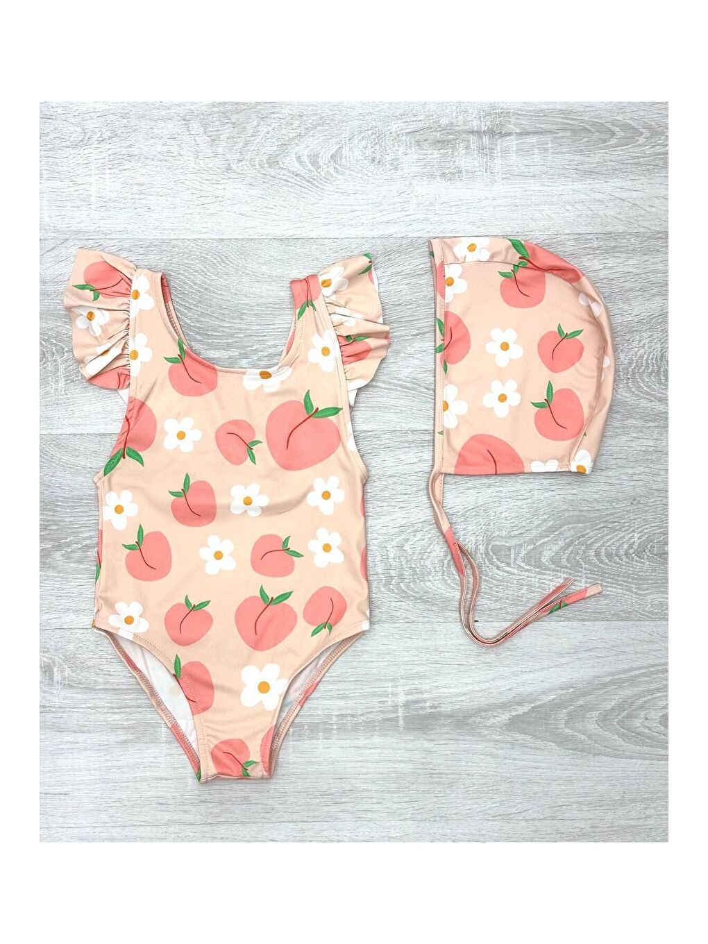 Turuncu Sırttan Çapraz Fırfır Detaylı Boneli Kız Çocuk Mayo