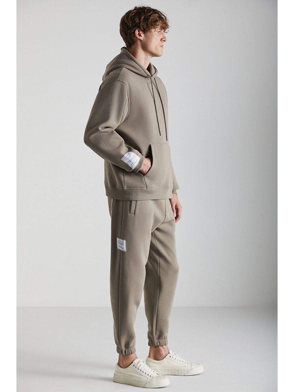 Bej Ashbourne Erkek Oversize Fit Kanguru Cepli Lastikli Paça Kol Etiket Detaylı Vizon Eşofman Takımı