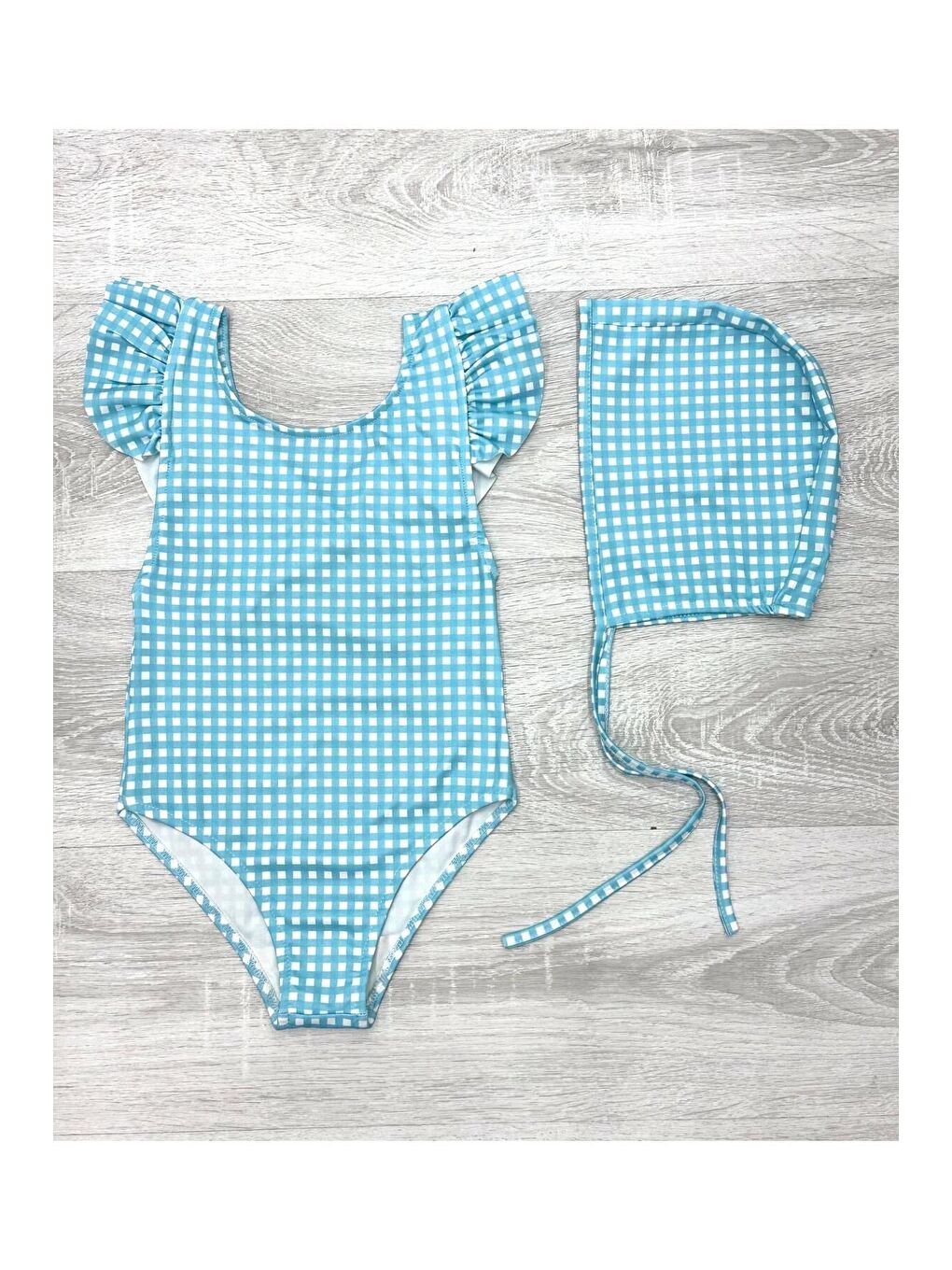 Mavi Sırttan Çapraz Fırfır Detaylı Boneli Kız Çocuk Mayo