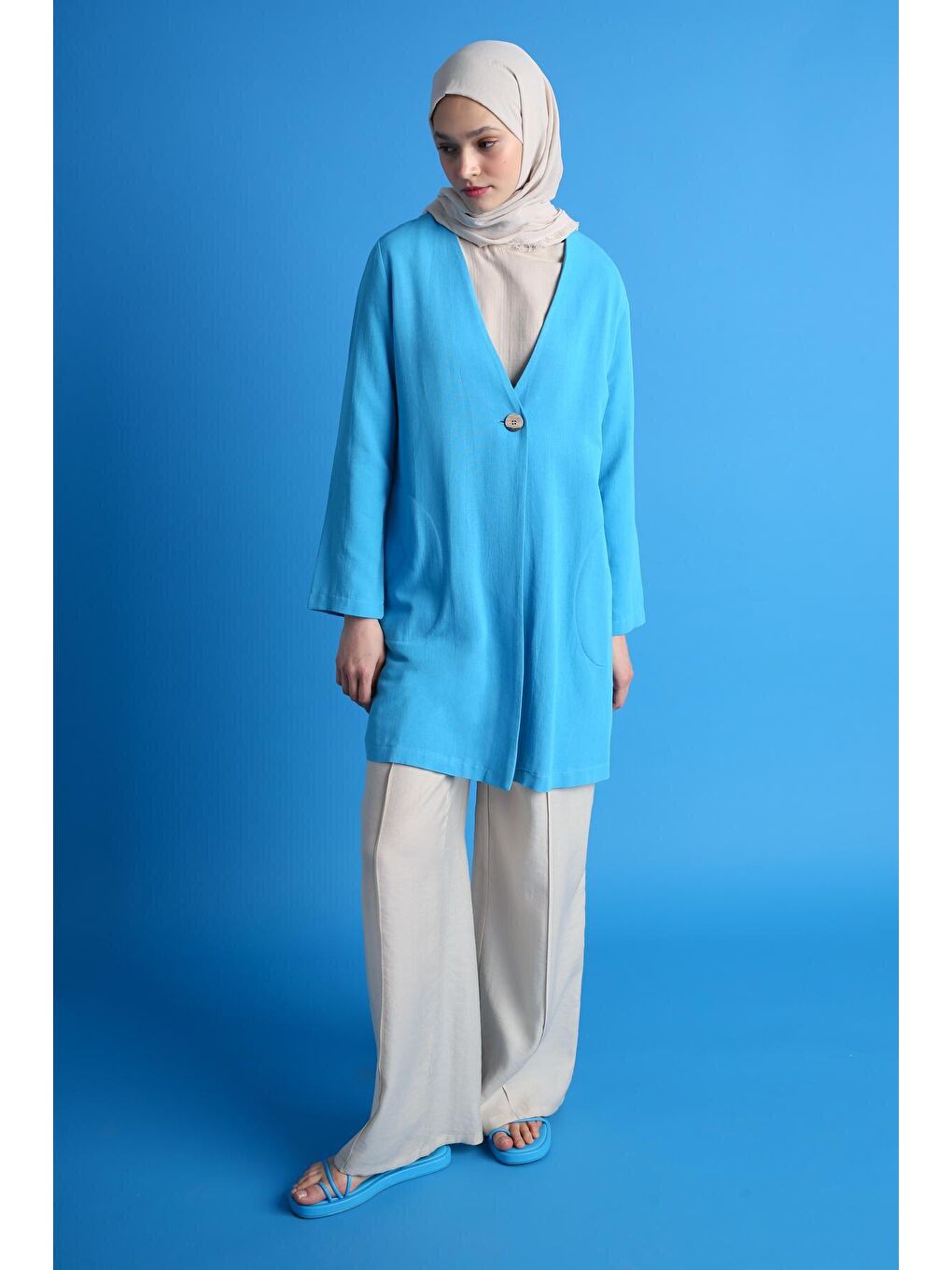 Turkuaz Tek Düğmeli V Yaka Cepli Keten Yırtmaçlı Ceket