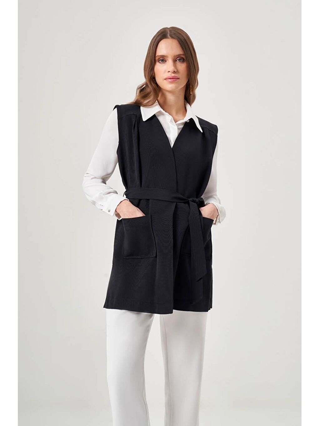 Keten Dokulu Cepli Siyah Yelek