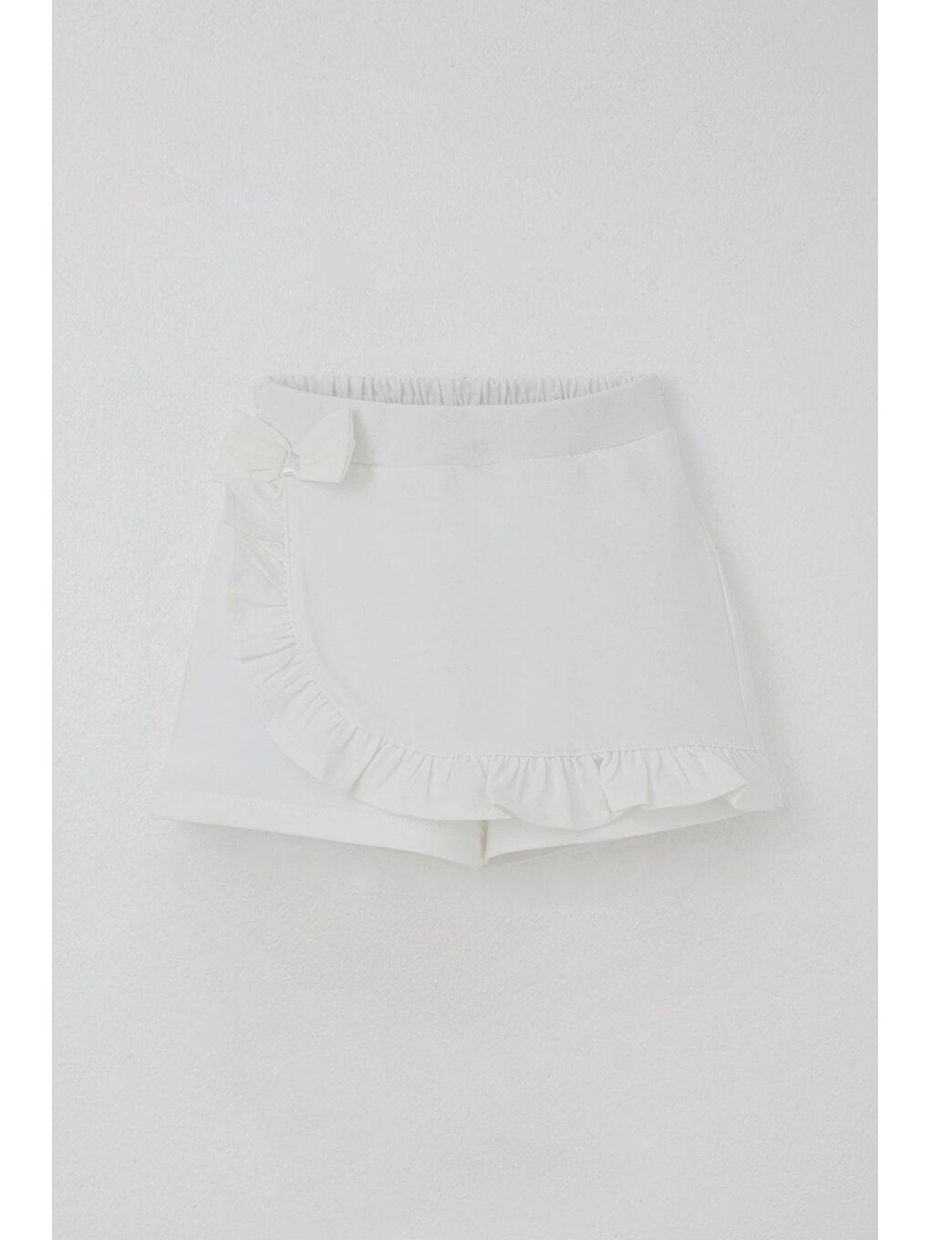 Kız Çocuk Şort Etek Fiyonk Aksesuarlı Fırfırlı Ekru (3-8 Yaş)