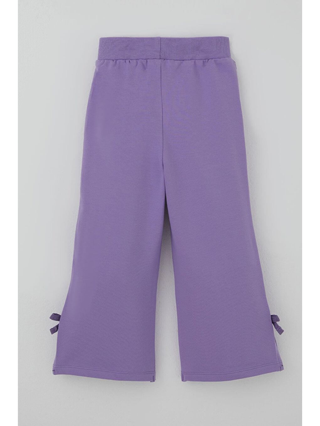 Kız Çocuk Eşofman Altı Paçası Yırtmaçlı Fiyonk Aksesuarlı Yanları Biyeli Lila (3-8 Yaş)-1