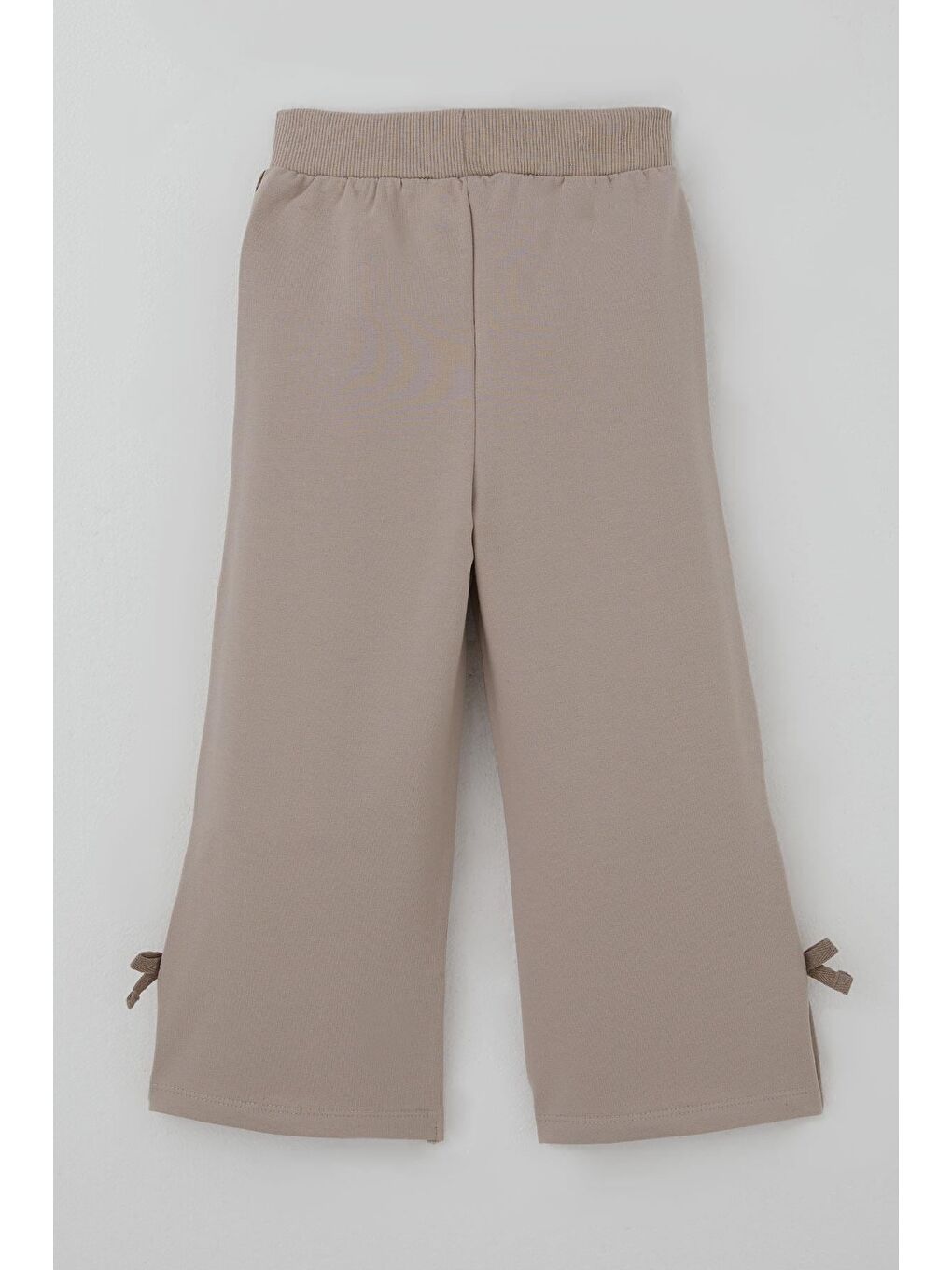 Bej Kız Çocuk Eşofman Altı Paçası Yırtmaçlı Fiyonk Aksesuarlı Yanları Biyeli Vizon (3-8 Yaş)-1