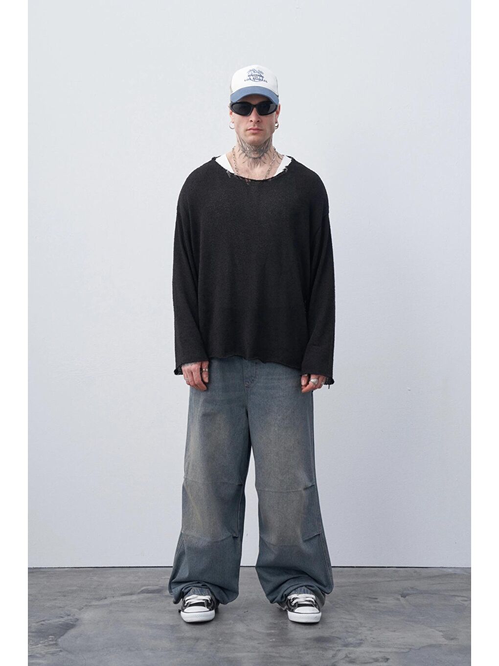 Mavi Yıkamalı Bel ve Paça Lastikli Baggy Jean