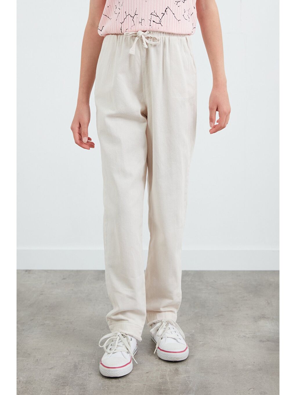 Bej Beli Lastikli Paçası Püsküllü Pantolon