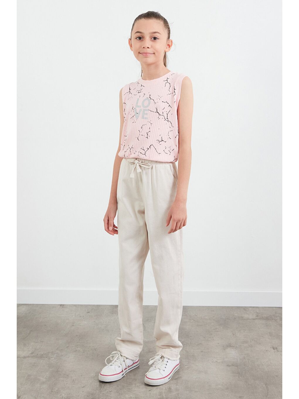 Bej Beli Lastikli Paçası Püsküllü Pantolon-1