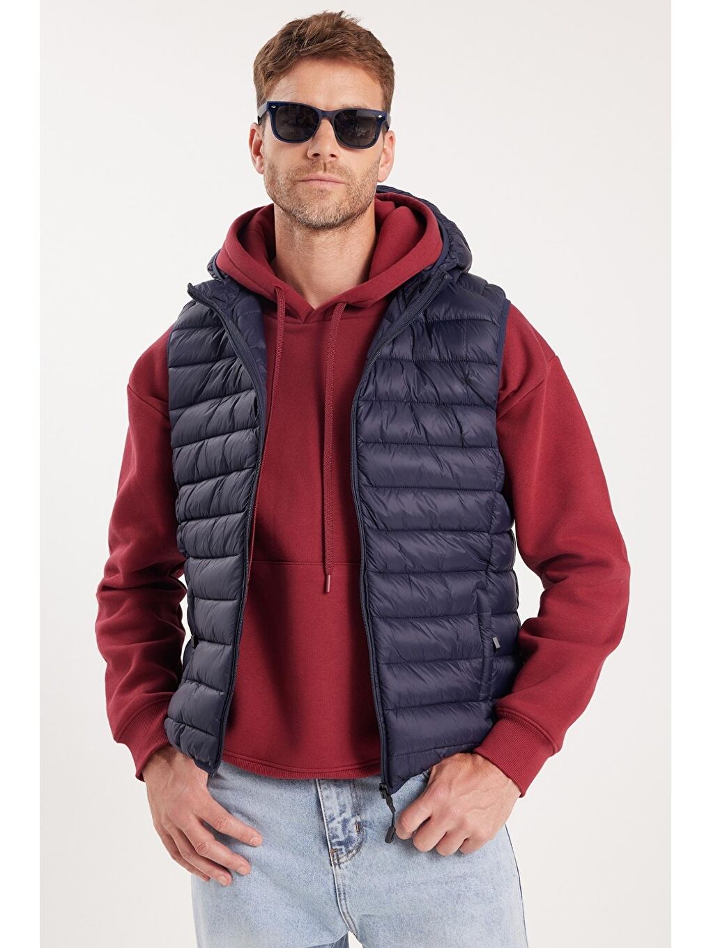 Erkek Relax Fit Rahat Kesim Sıfır Kol Kapüşonlu Çift Cep Fermuarlı Sıcak Tutan Lacivert Şişme Yelek-1