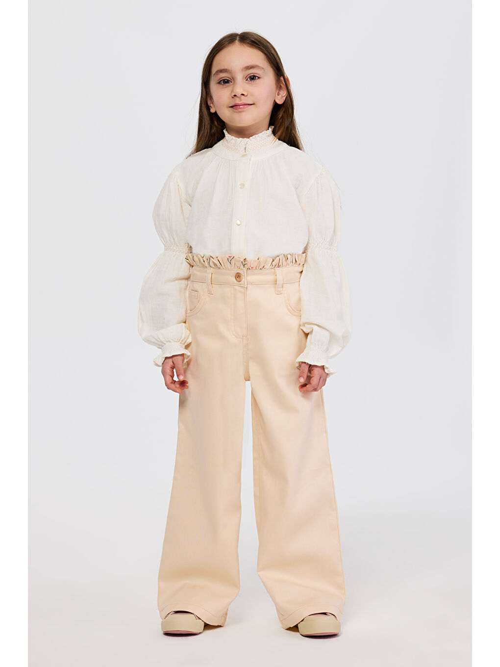 Kız Çocuk Beli Fırfır Detaylı Bej Pantolon