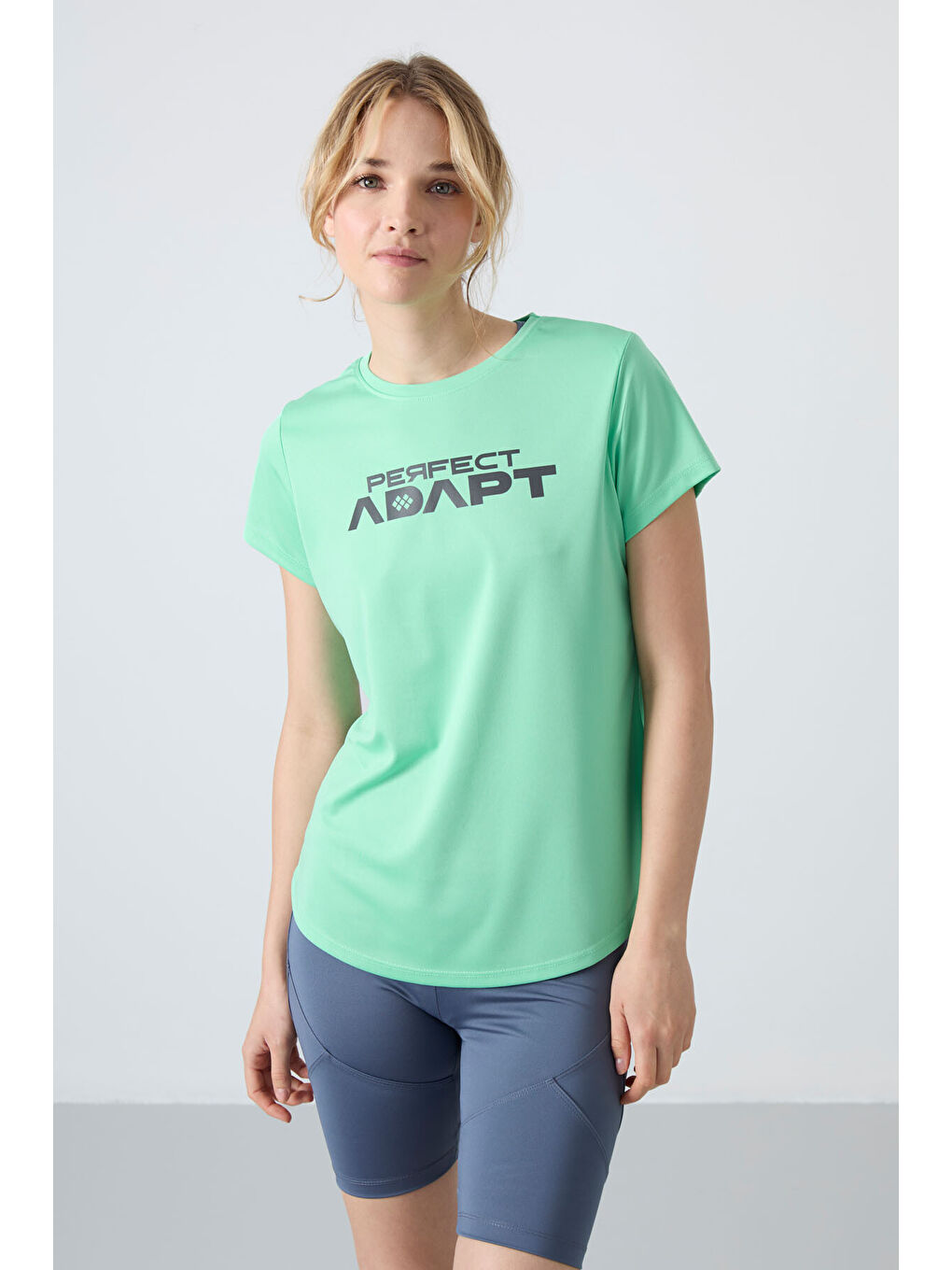 Turkuaz Nefes Alan Dokulu İnce Performans Kadın Tişört - 97283-6