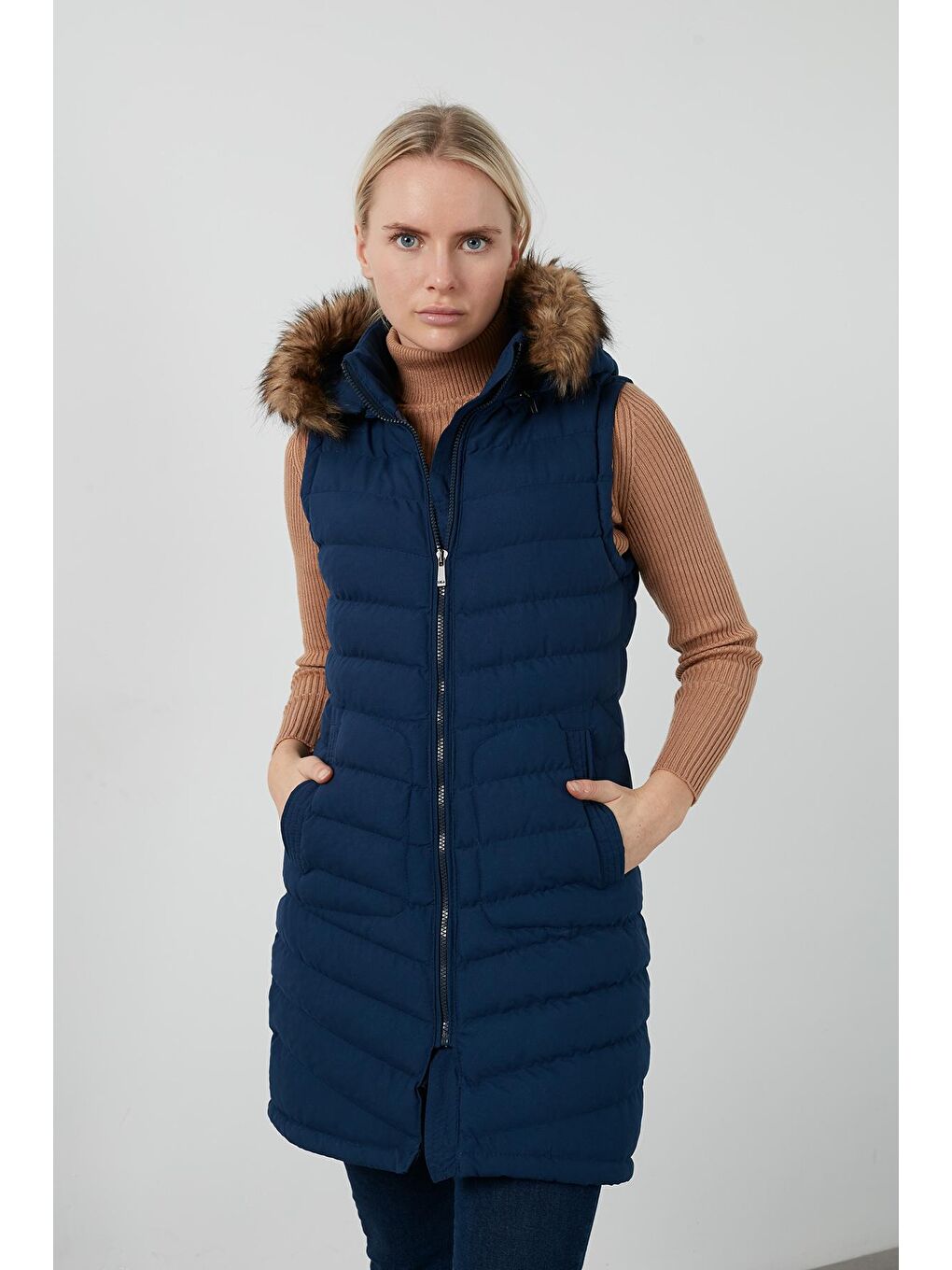 İndigo Dar Kesim Kapüşonlu Uzun Şişme Yelek 5568083