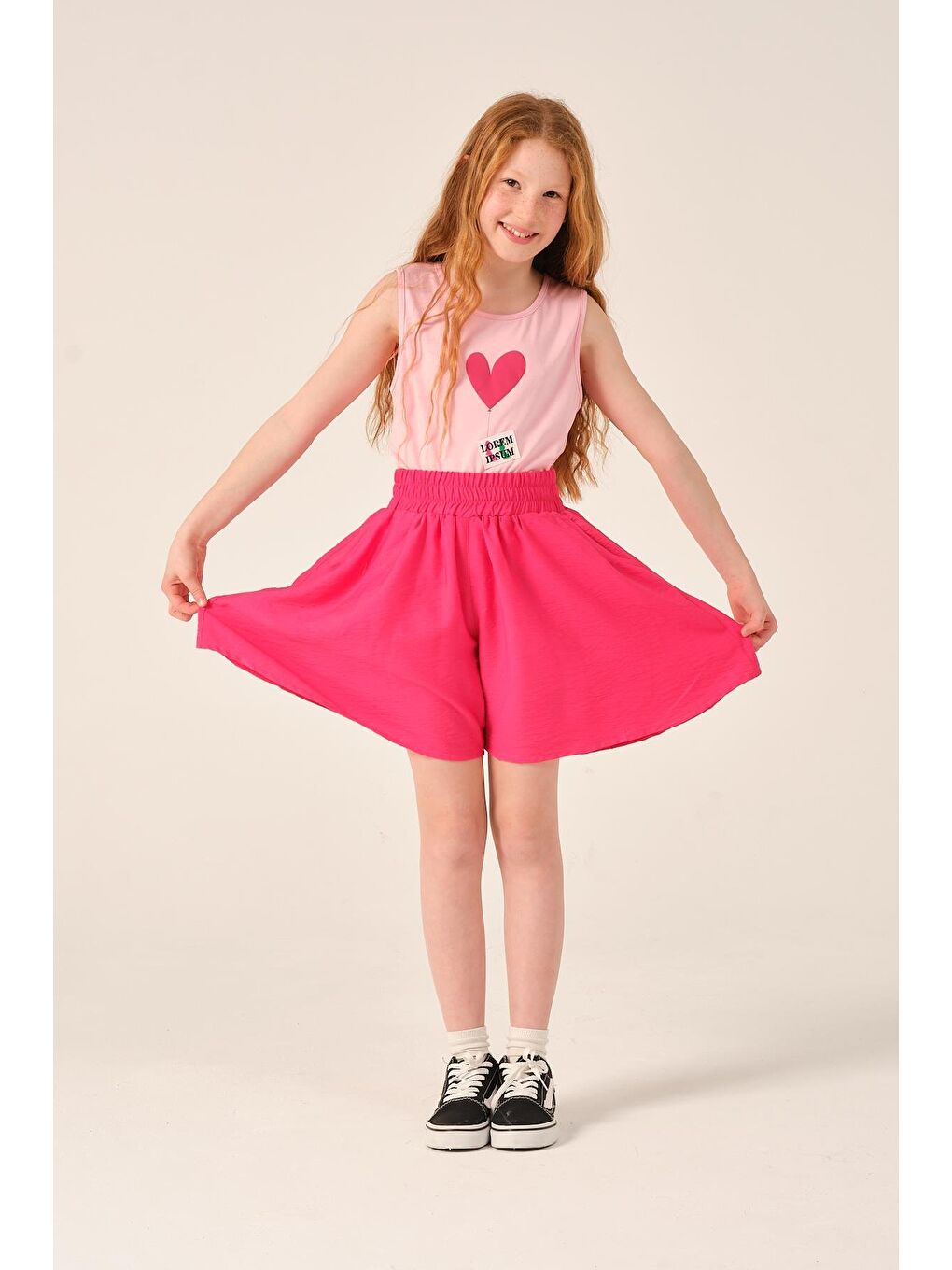 Fuşya Genç Kız Çocuk Etek Görünümlü Dokuma Şort-1