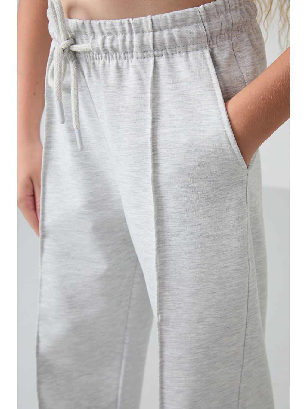 Beyaz Kar Melanj Cepli Ön Dikiş Detaylı Geniş Paça Kız Çocuk Eşofman Altı -75144-8