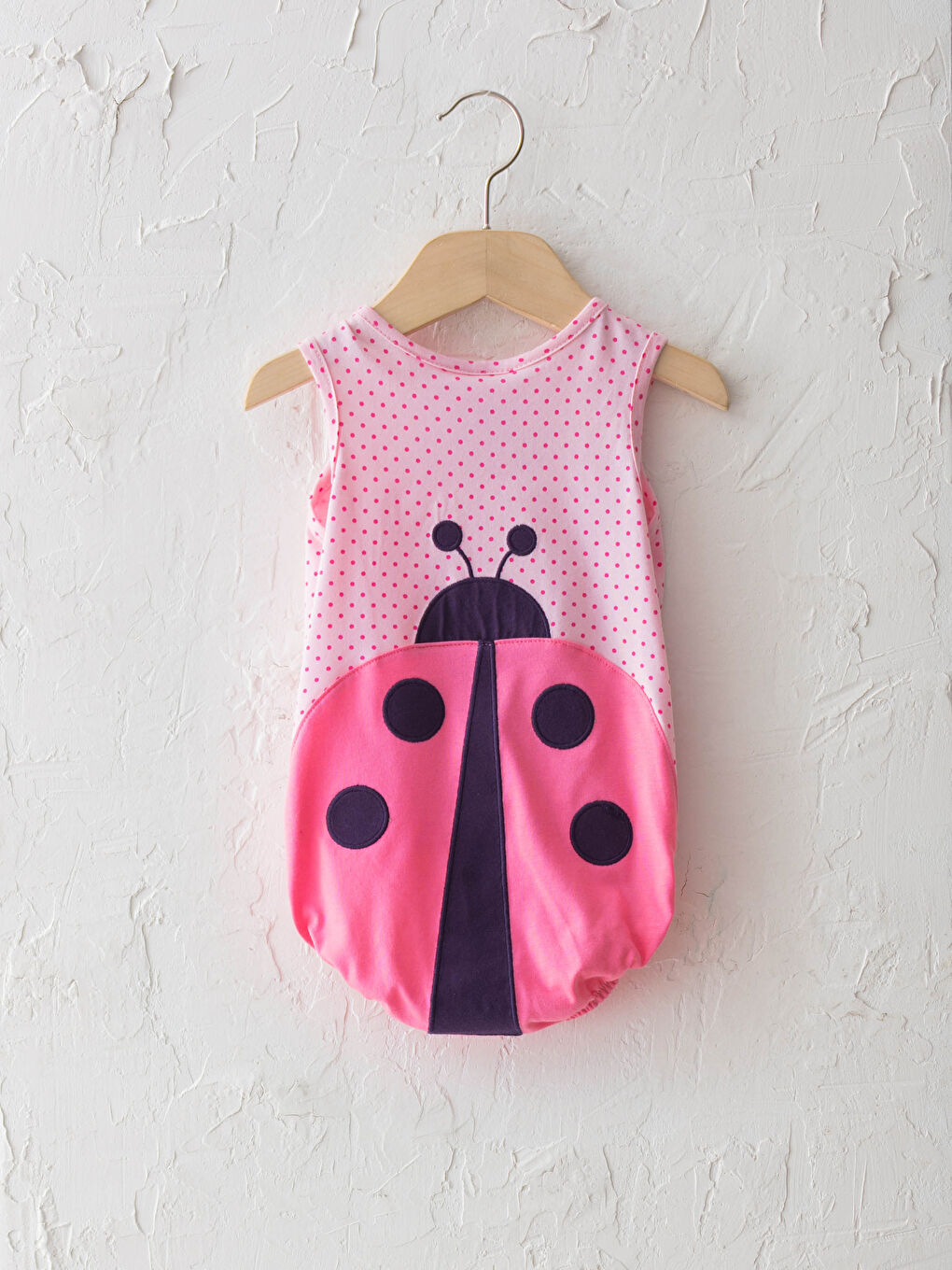 Дөңгелек жағалы горошекпен қыз балаға арналған түймесі бар боди және шашқа арналған таспа-1