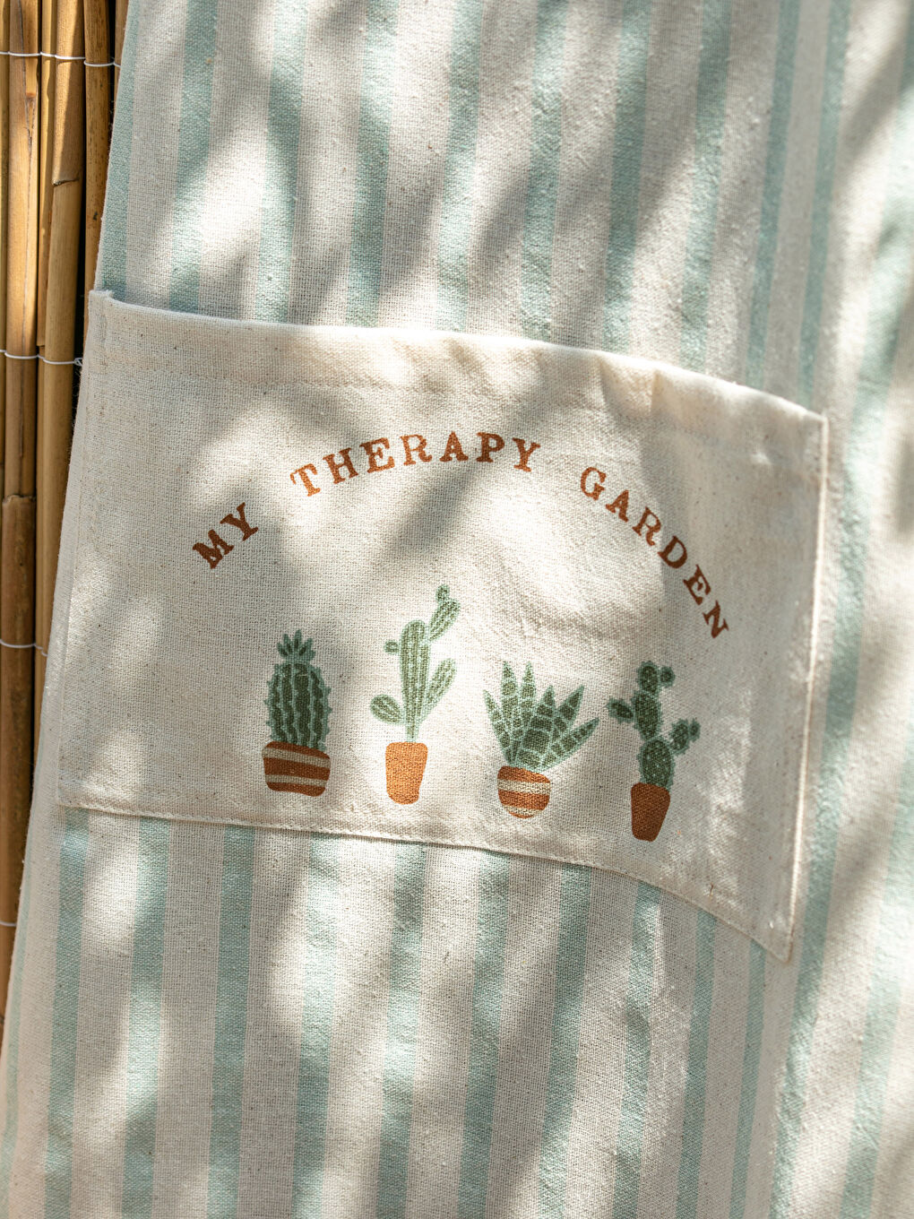 مريلة كوزينة بالقطن مطبوعة بنقشة الصبار ومخططة-1