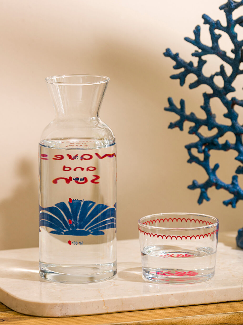 Теңіз қабыршағы бейнеленген шыны су құманы 700 мл-1