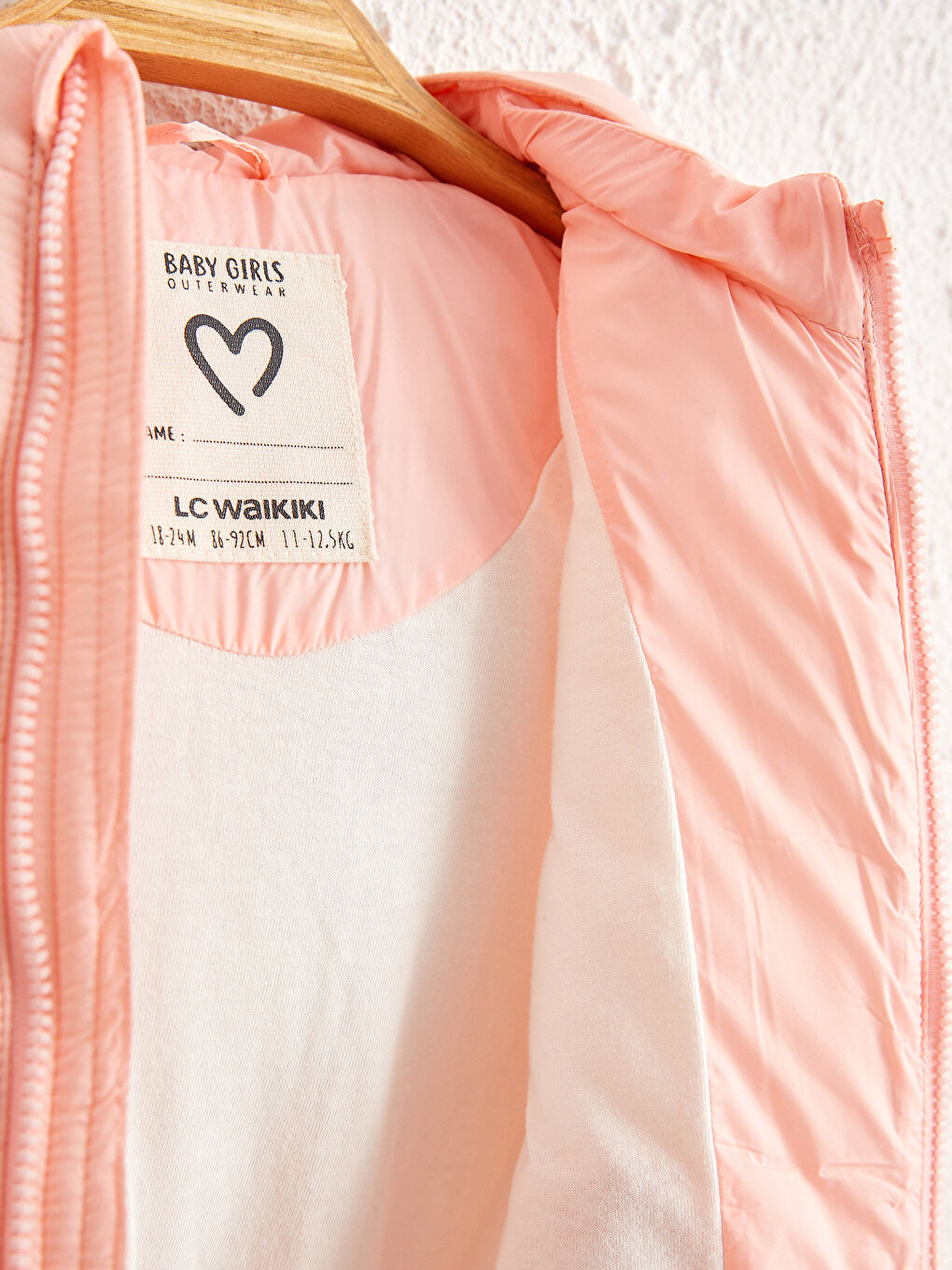 Пухена жилетка за бебе момиче-2