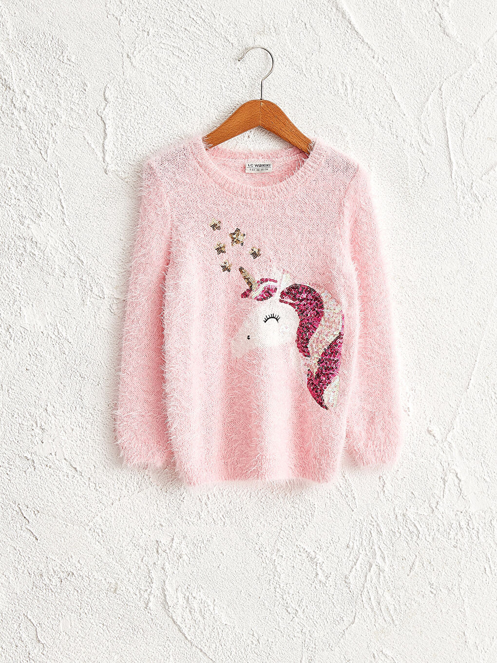 Қыздың жылтыр трикотаж жемпірі