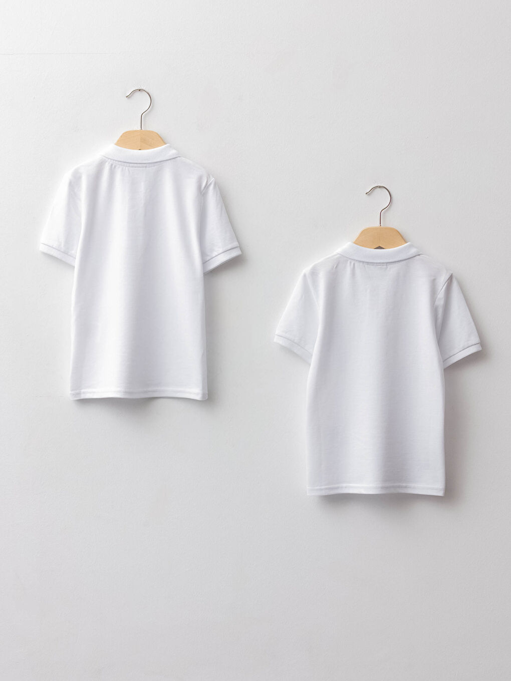 تيشيرت ياقة بولو سادة كم قصير قطن أولاد - عبوة 2-1