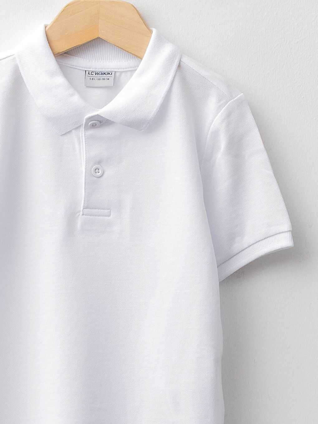 تيشيرت ياقة بولو سادة كم قصير قطن أولاد - عبوة 2-2