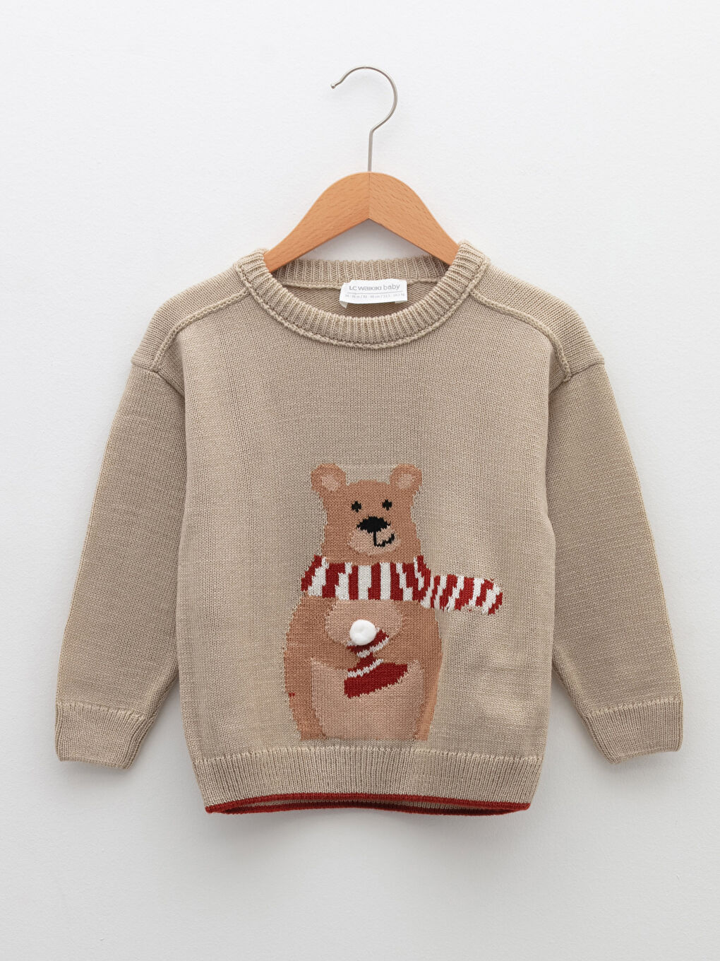 سترة تريكو بنقشة ياقة دائرية وكم طويل للأولاد الرضع